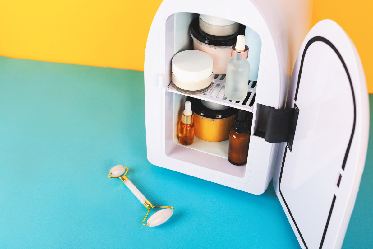 mini refrigerator with various skincare products