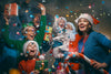 family celebrating a Christmas party with gifts and confetti